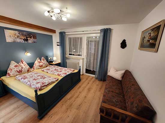 Schlafzimmer Ferienwohnung Pension Luttinger