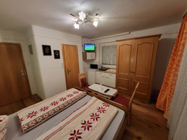 Cozy bed in the double room at Apartment Luttinger